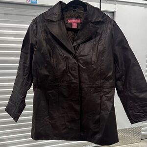 Woman Within Dark Brown Leather Jacket